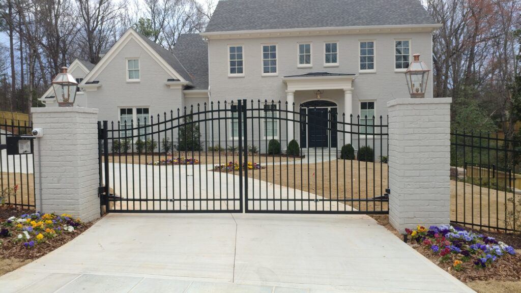 Aluminum double driveway gate with spear top and access controls