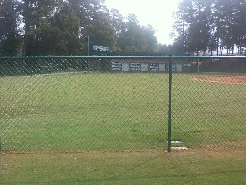 Green chain link fence installation at a metro Atlanta baseball field