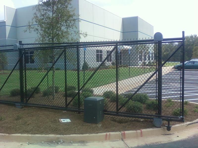 Black chain-link cantilever slide gate