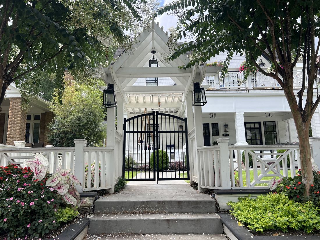 Custom welded-steel arched gate
