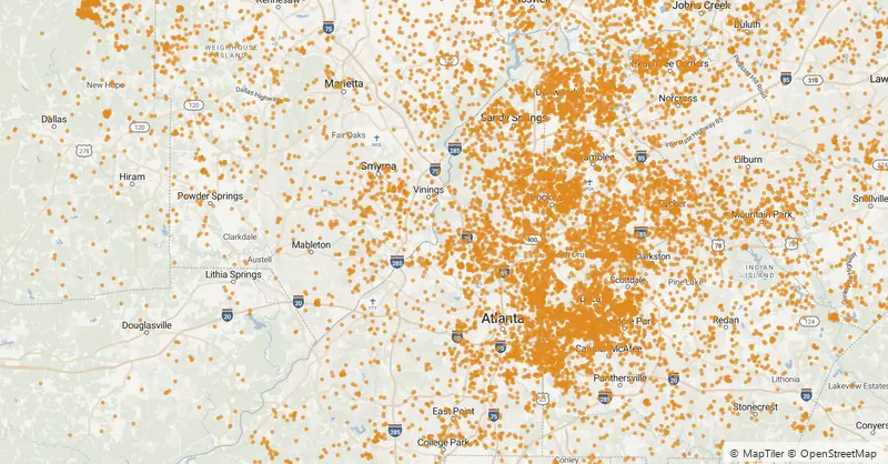 Street map of metro Atlanta and its interstates covered in more than 15,000 orange dots — every dot a fence installed by FenceWorks of Georgia