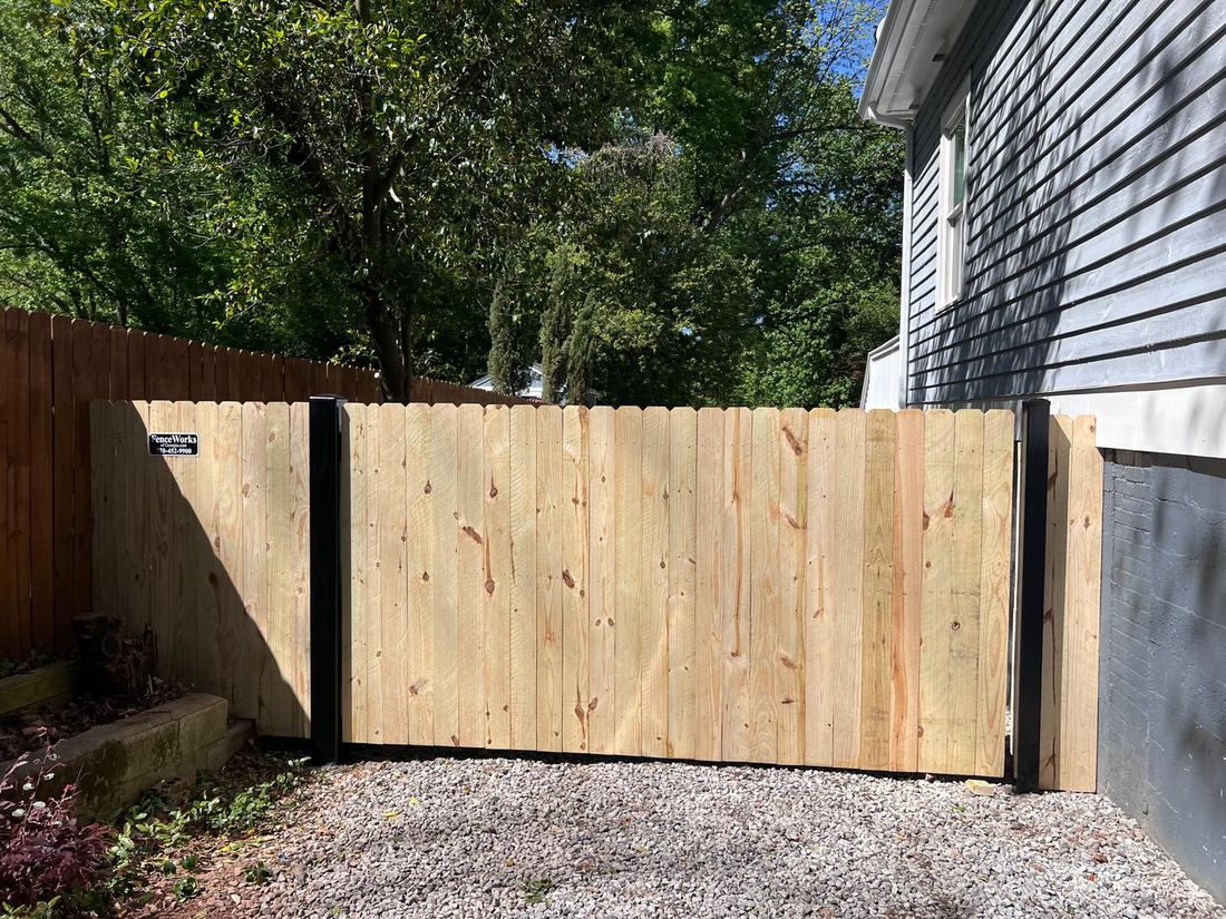 Wood dog ear privacy driveway gate