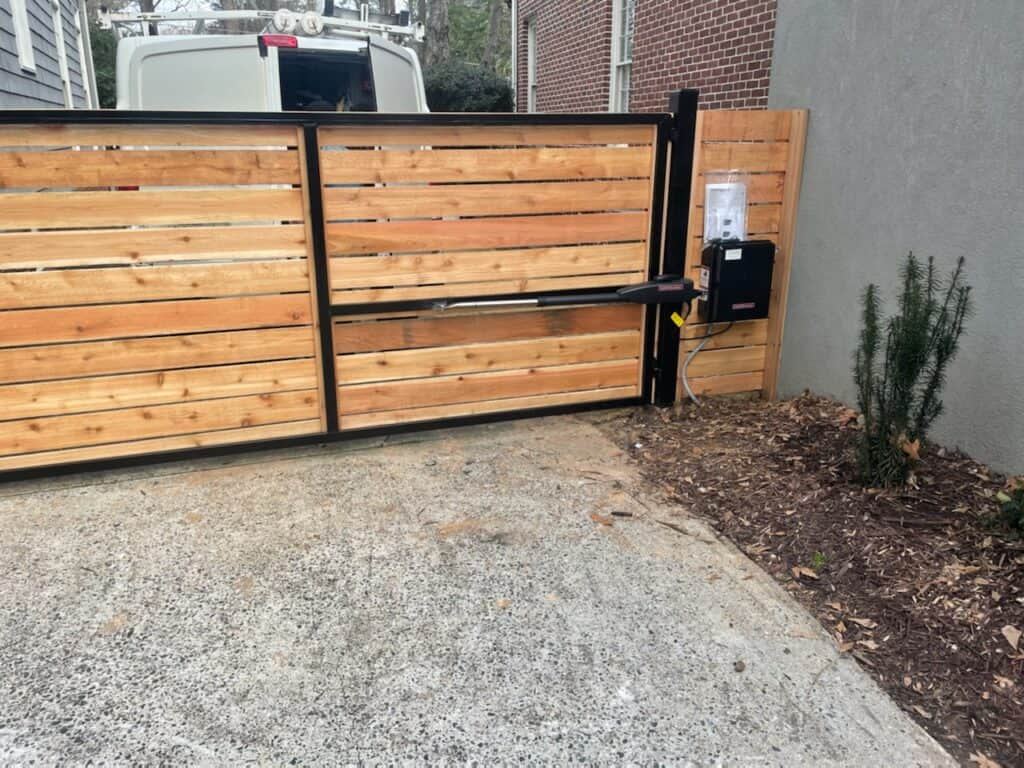 Custom horizontal-slat wood gates with entry control