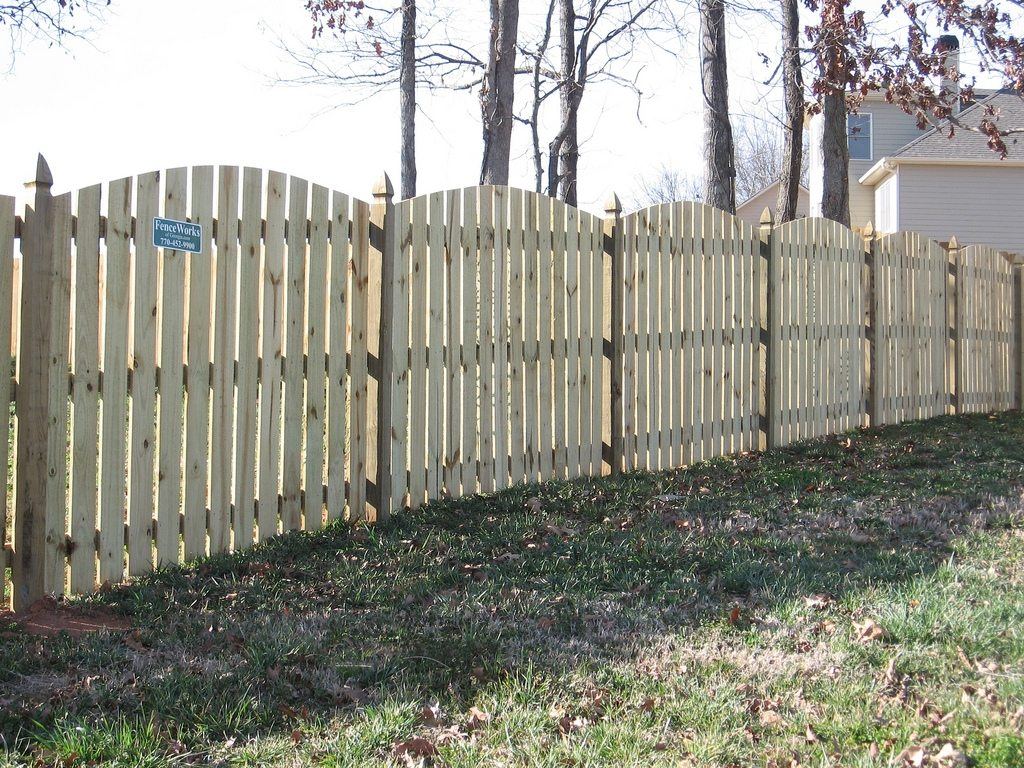 Pine scalloped spaced picket fence