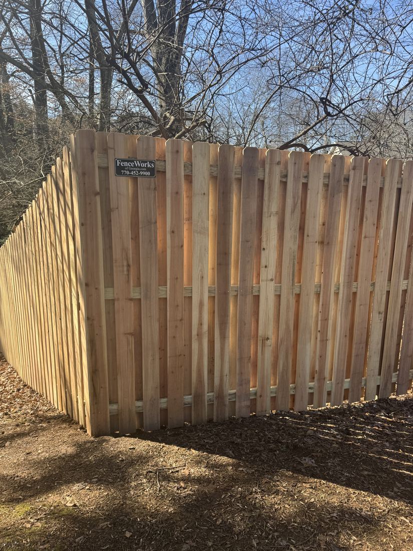 Wood shadowbox privacy fence finished on both sides