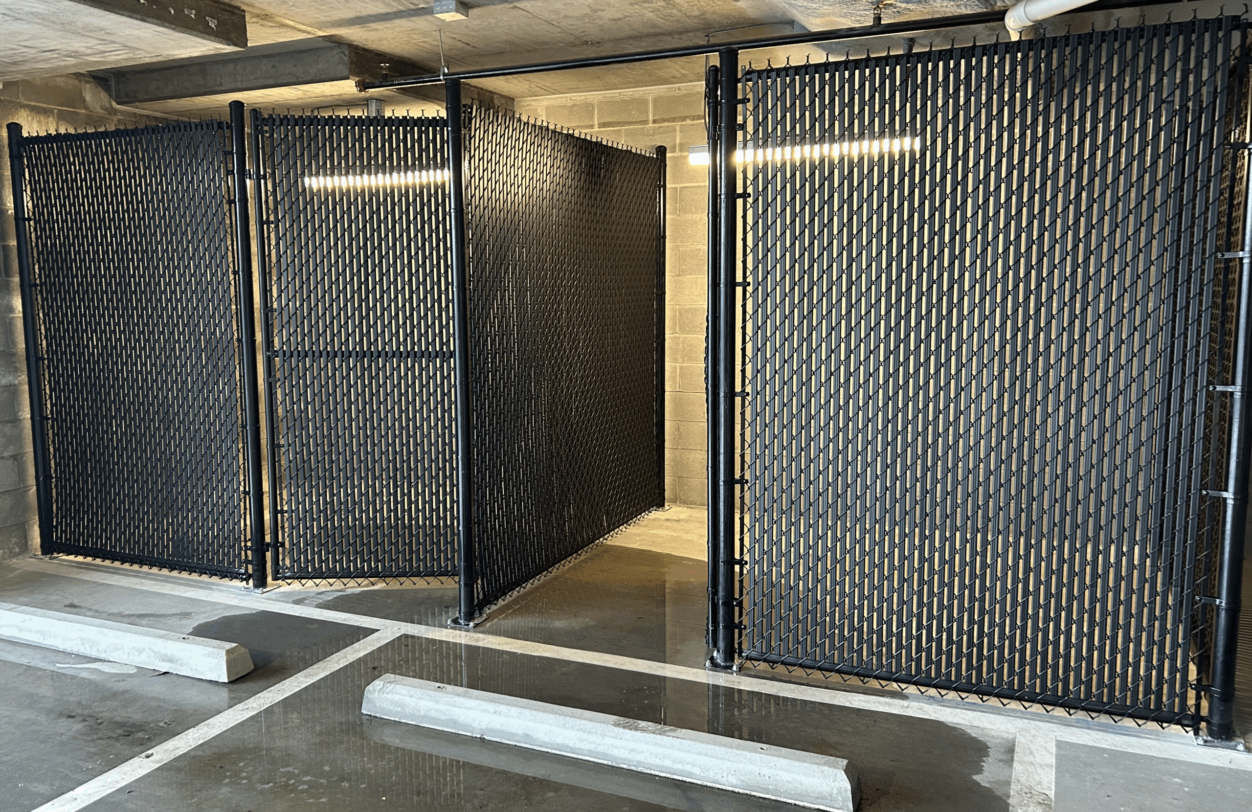Black Chain Link Cage in parking deck