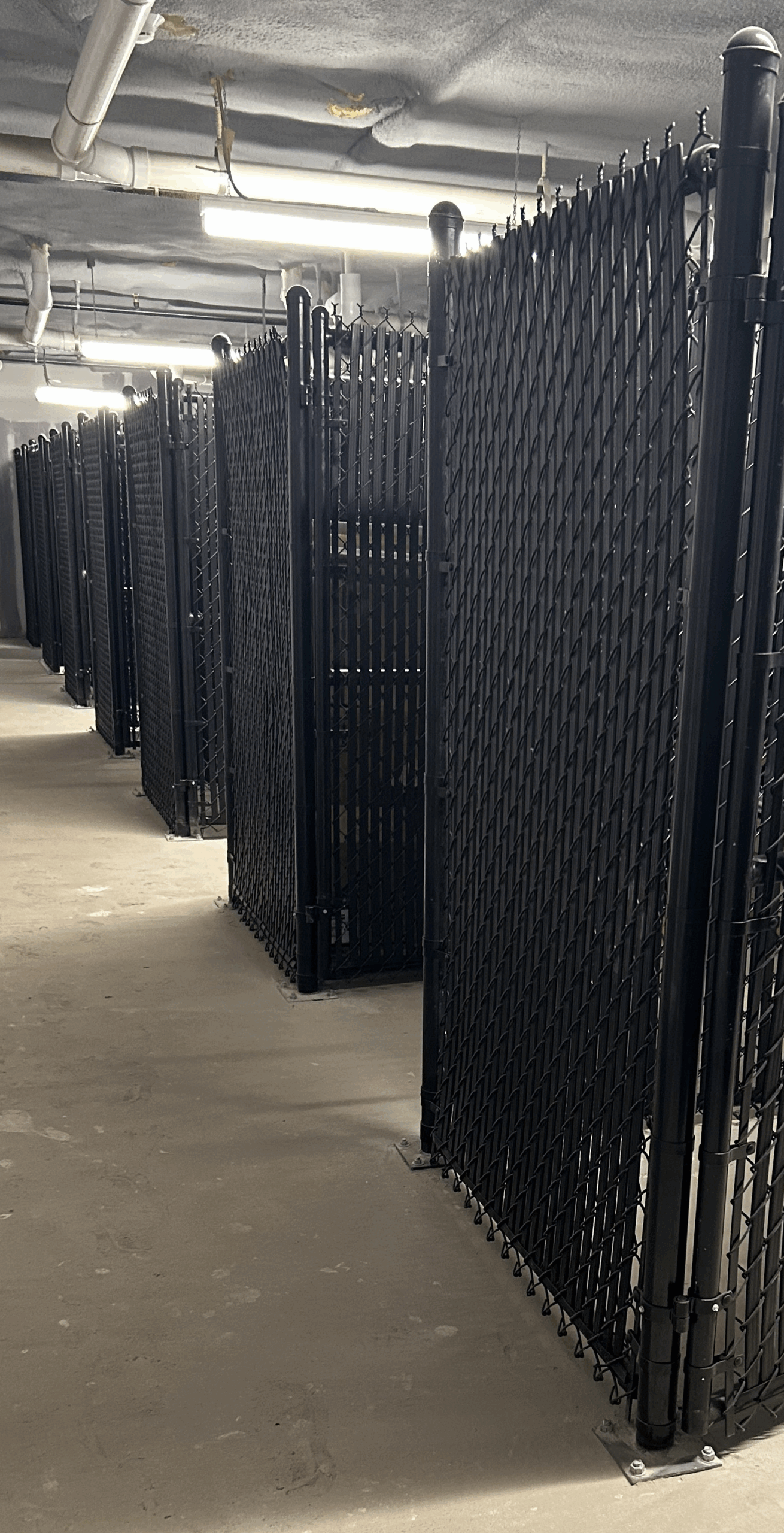 Black Chain Link Cages with Privacy Slats